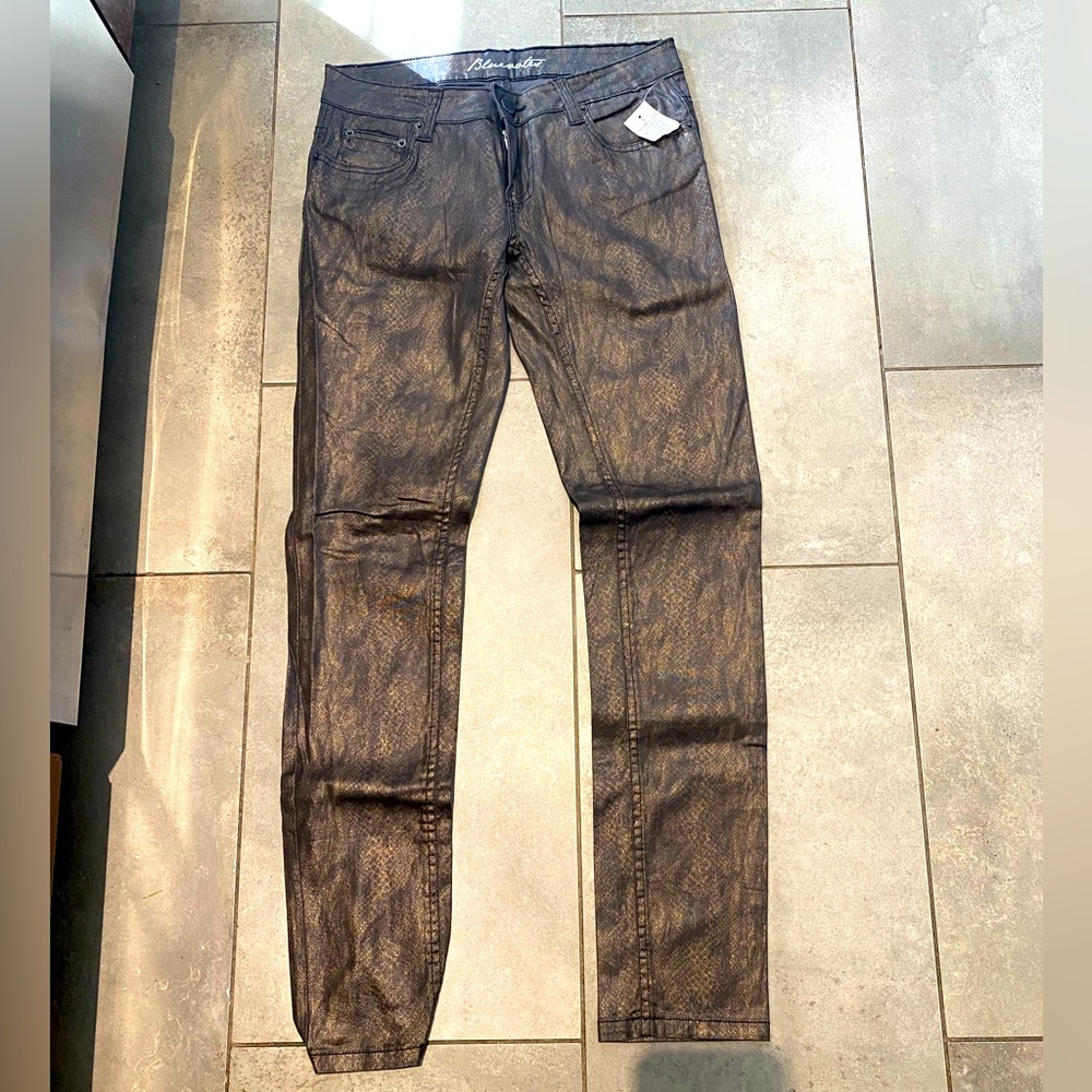 Snake print metallic skinny jeans